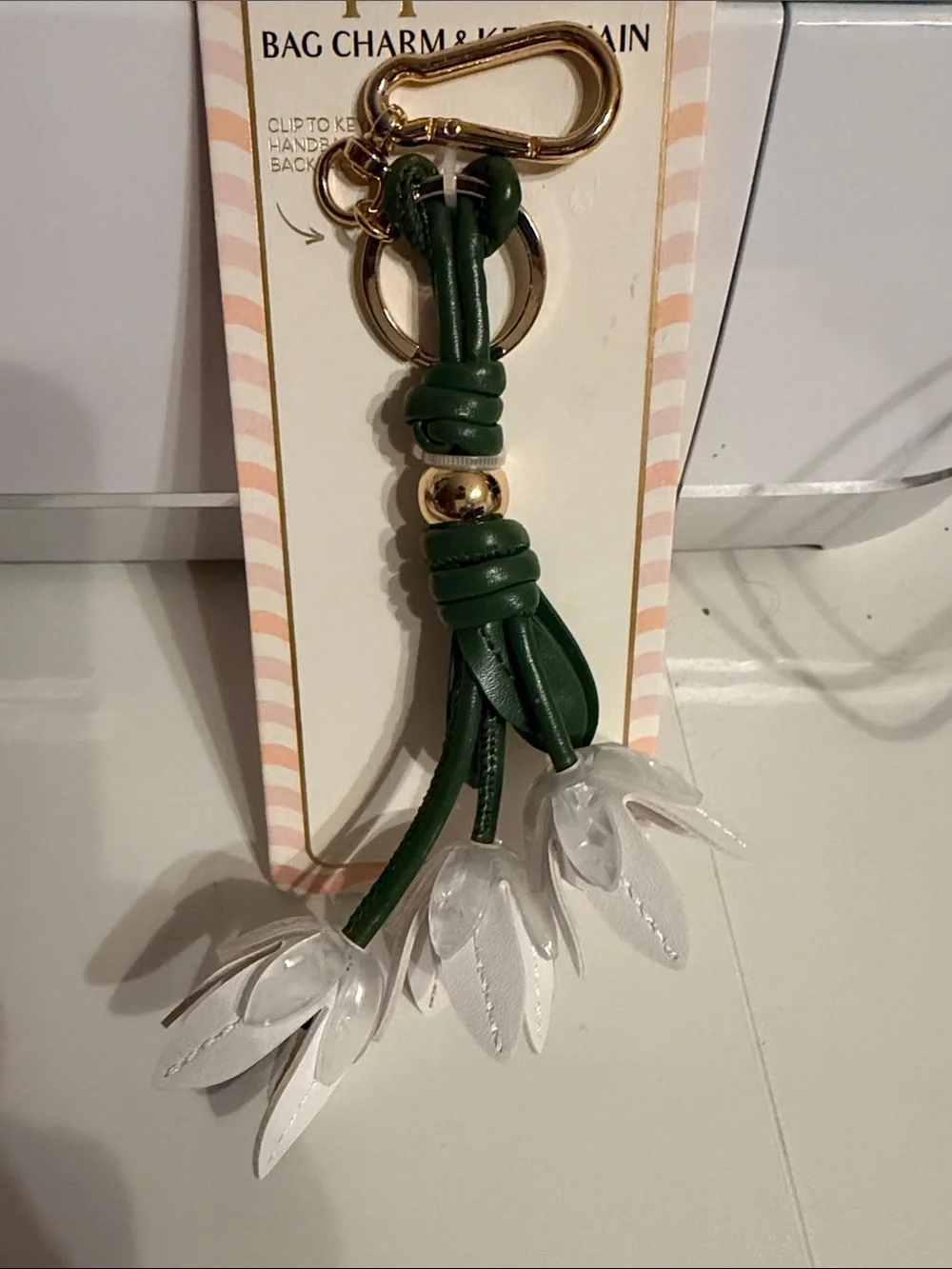 Piper Green Tassel Key & Card Holder with White Petal Accents